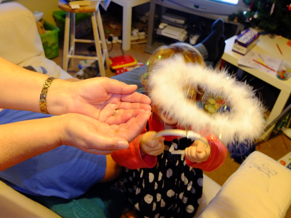 Nannan holding the eggs/chicks and the 'nest' that Caius had previously been wearing on his head...